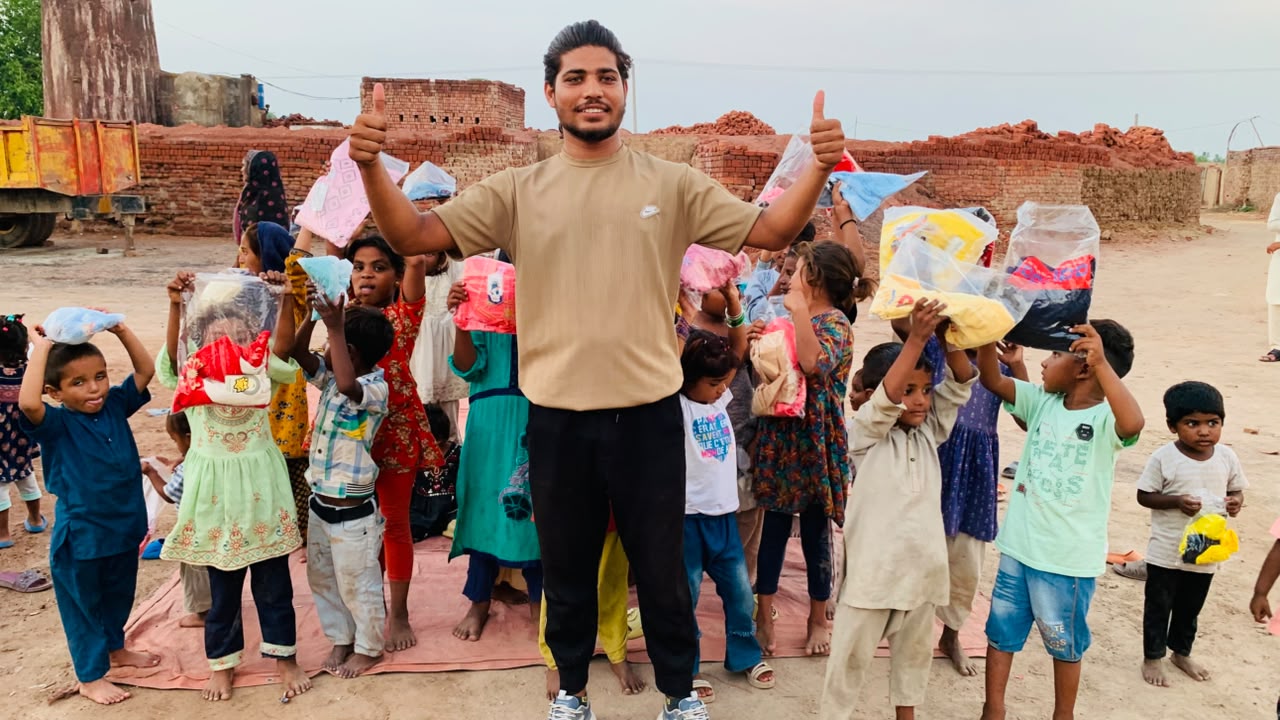 Children receiving new clothes